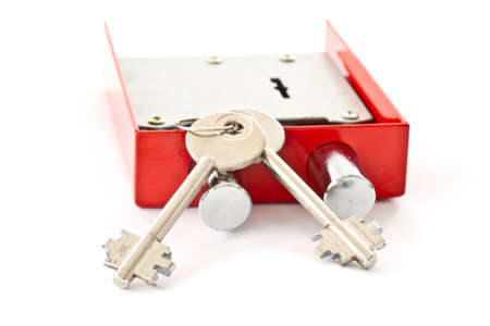 red castle with the keys on a white backgroundの写真素材