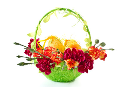 bright flowers in a light green Easter basket