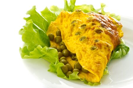 scrambled eggs with green pepper on lettuceの写真素材