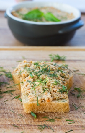 fresh homemade meat pate with bread and herbsの写真素材