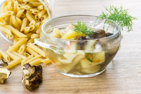 mushroom soup with noodles in a plateの写真素材