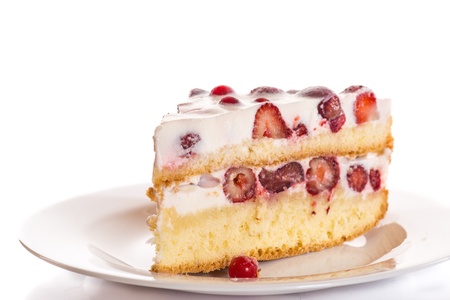 Summer fruit cake with berries on a white backgroundの写真素材