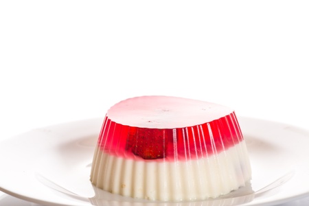 milk jelly with fruit on a white backgroundの写真素材