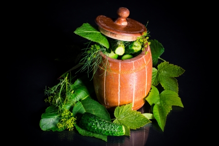 pickles with spices in a wooden barrelの写真素材