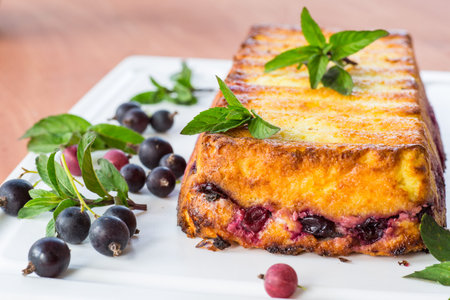 Cottage cheese pie with berries decorated with mint