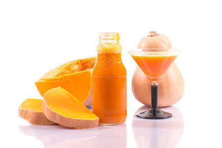 Fresh pumpkin juice on a white backgroundの写真素材