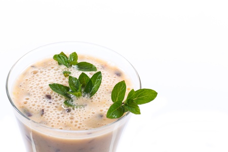 milkshake with whipped fresh plums on a white backgroundの写真素材