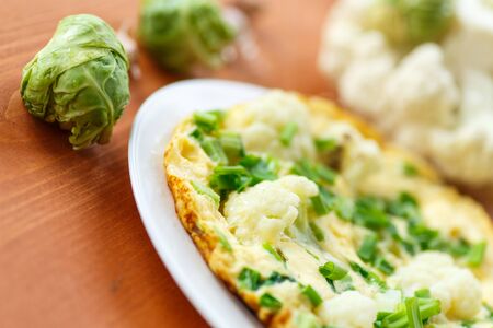 scrambled eggs with cauliflower and brussels sproutsの写真素材