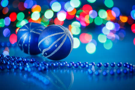 blue Christmas ball on a blue backgroundの写真素材