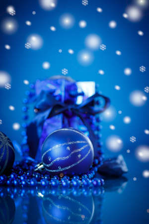 blue Christmas ball on a blue backgroundの写真素材