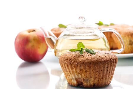 sweet apple muffins on a white backgroundの写真素材