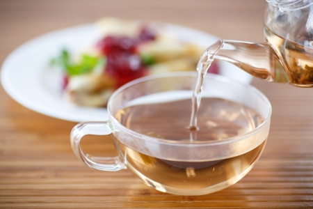 poured into a cup of tea for breakfastの写真素材