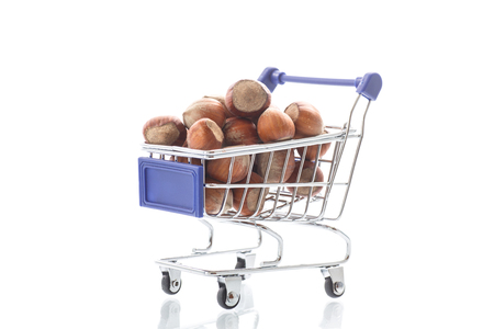 ply truck with hazelnuts on a white backgroundの写真素材