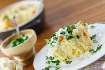 vegetable casserole with rice and cauliflower sauceの写真素材