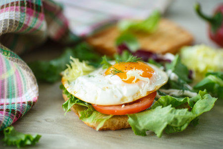 sandwich with a fried egg and lettuce