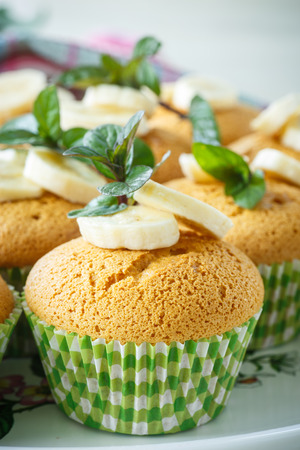 sweet banana muffins banana slices and mintの写真素材