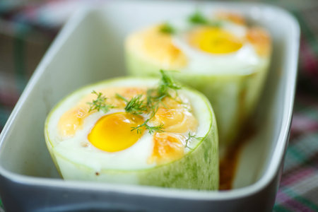 zucchini baked inside with egg and cheeseの写真素材