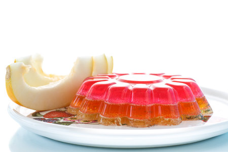 multi-layered fruit jelly isolated on white background