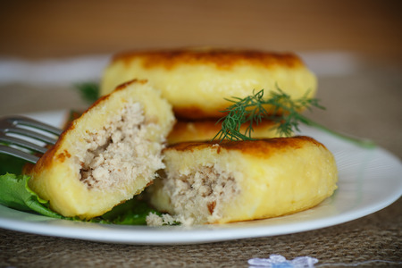 Potato cakes with meat on the plateの写真素材