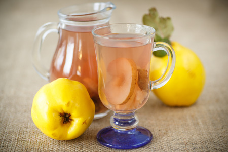 sweet quince compote in a carafe on the tableの写真素材