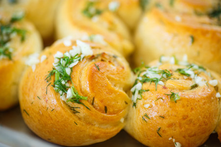 garlic bread rolls with garlic, dill and herbsの写真素材