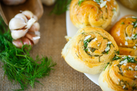 garlic bread rolls with garlic, dill and herbsの写真素材