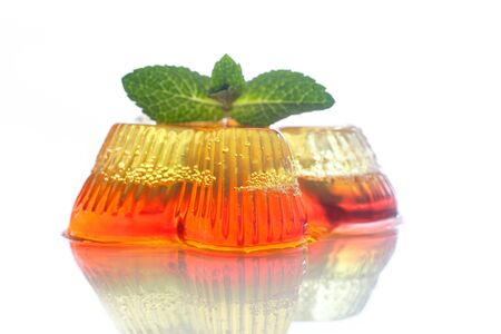 colorful fruit jelly sweets on a white plateの写真素材
