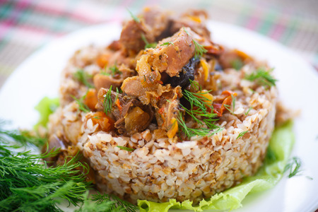 buckwheat cooked with stewed chicken gizzards in gravyの写真素材