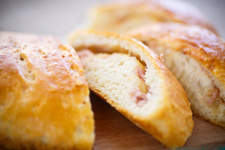 baked bread stuffed with cheese and sausage