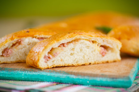 baked bread stuffed with cheese and sausage