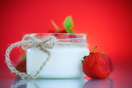 sweet delicious homemade yogurt with fresh strawberriesの写真素材
