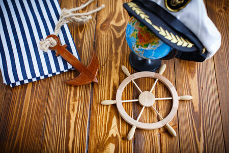 Decorative wooden steering wheel on an old wooden table