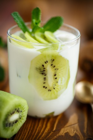 Greek yogurt with kiwi  in a glassの写真素材