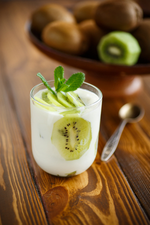Greek yogurt with kiwi  in a glassの写真素材
