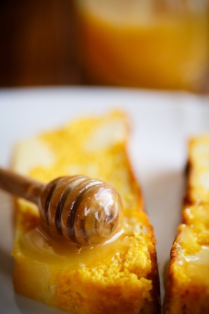 sweet curd pudding with pumpkin and honey insideの写真素材