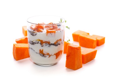 Greek yogurt with baked pumpkin and poppy seedsの写真素材