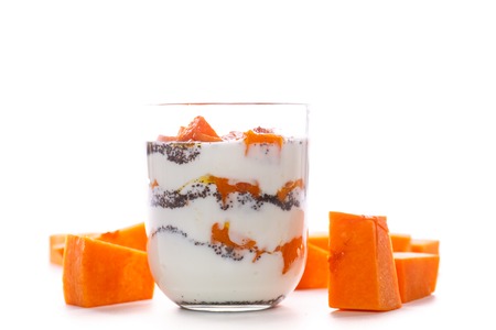 Greek yogurt with baked pumpkin and poppy seedsの写真素材