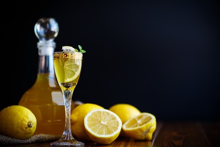 sweet lemon alcoholic brandy in the decanterの写真素材