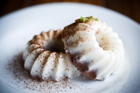 sweet milk chocolate panna cotta on a plateの写真素材