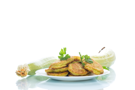 zucchini pancakes on a plateの写真素材