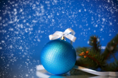 beautiful new year toys on an abstract blue backgroundの写真素材