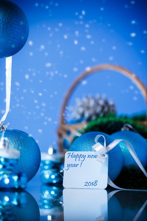 beautiful new year toys on an abstract blue backgroundの写真素材