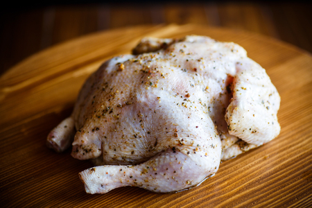 Raw chicken marinated with spicesの写真素材