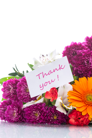 beautiful bouquet of different flowers on white backgroundの写真素材