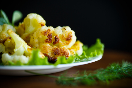 cauliflower fried in batter on a plateの写真素材