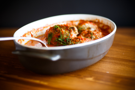 meatballs with tomato sauce on the tableの写真素材