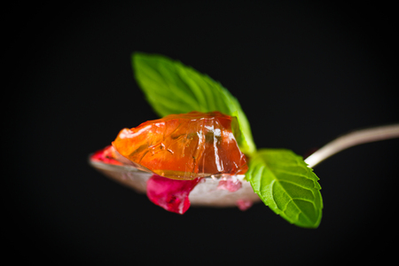 sweet multi-colored jelly on a black backgroundの写真素材