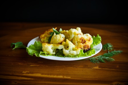 cauliflower fried in batter on a plateの写真素材