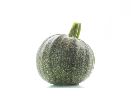 big round zucchini on white background - courgetteの写真素材
