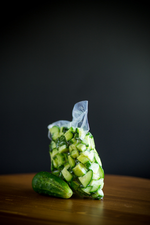 fresh sliced cucumbers in a vacuum packageの写真素材